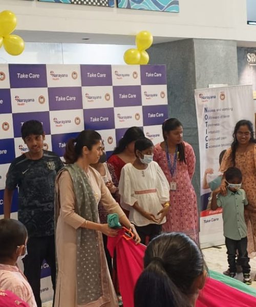 Children engaging in a joyful event at SRCC Children's Hospital Mumbai.
